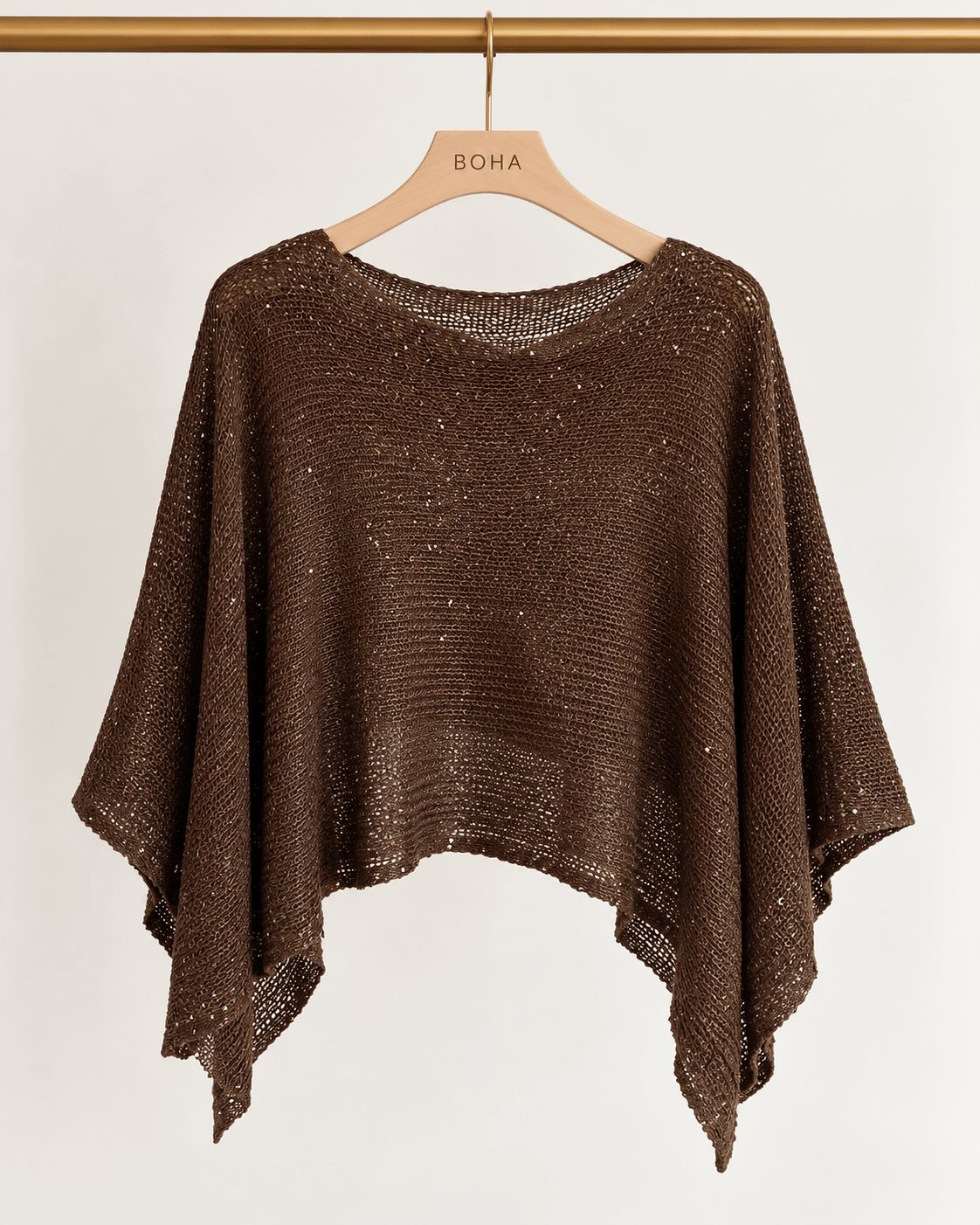 Poncho Jasmim castanho de malha brilhante, bainha assimétrica e ombro largo