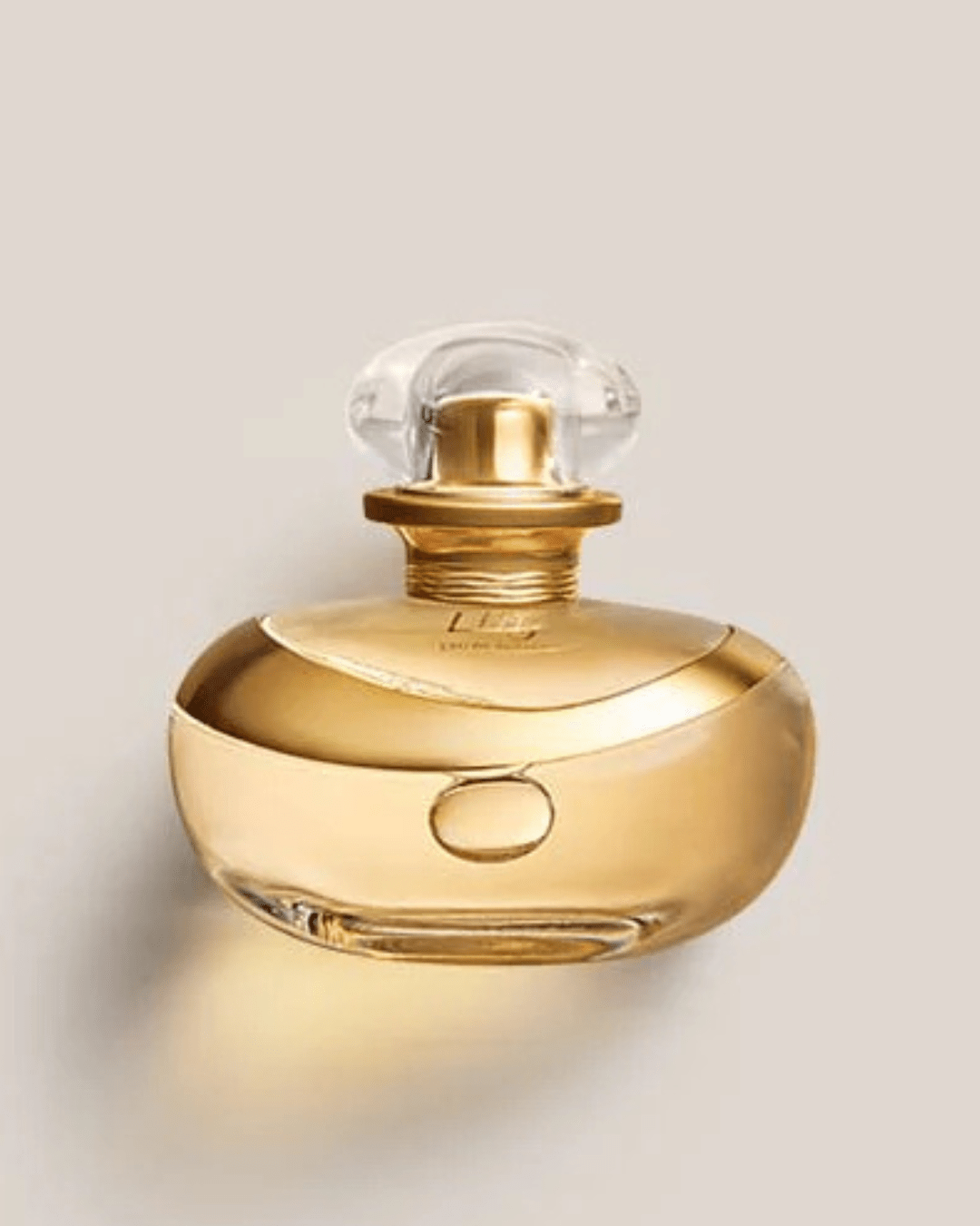 Frasco de eau de parfum dourado com tampa transparente, 75 ml